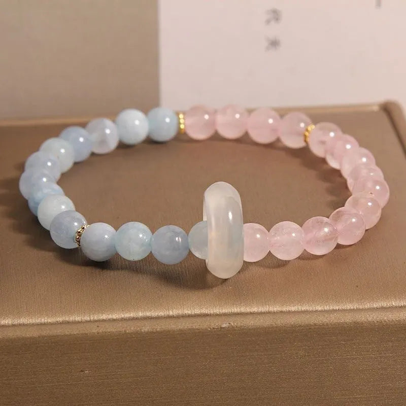 Women's aquamarine dopamine bracelet with pink blue beads and geometric round elements
