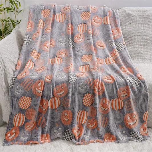 Child's flannel blanket with cartoon pattern draped over an air conditioning unit