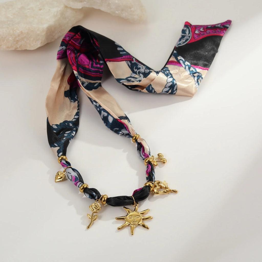Women's geometric pendant necklace with gold chain and matching bracelet for autumn winter fashion