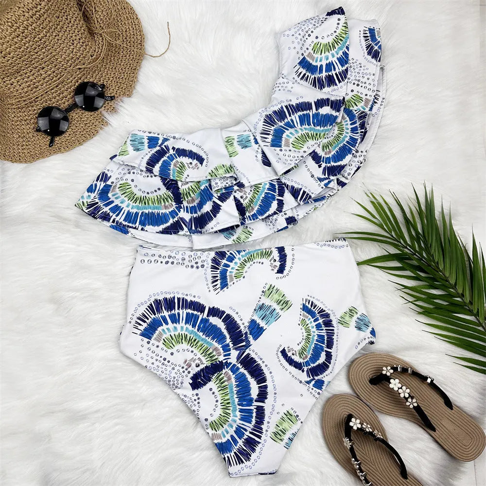 White women's one-shoulder swimsuit with split hem and double-layer lotus leaf design