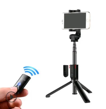 Black Bluetooth selfie stick with tripod bracket extended showing phone clamp and remote control