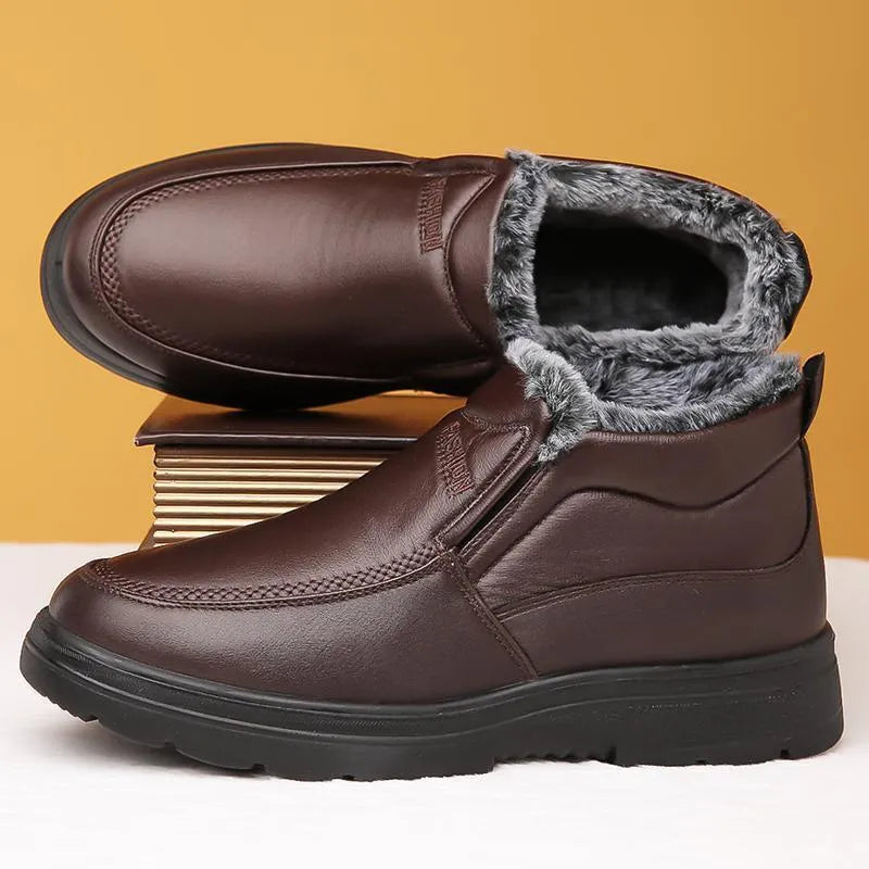 Men's black and brown fleece-lined winter slip-on shoes with a non-slip rubber sole.