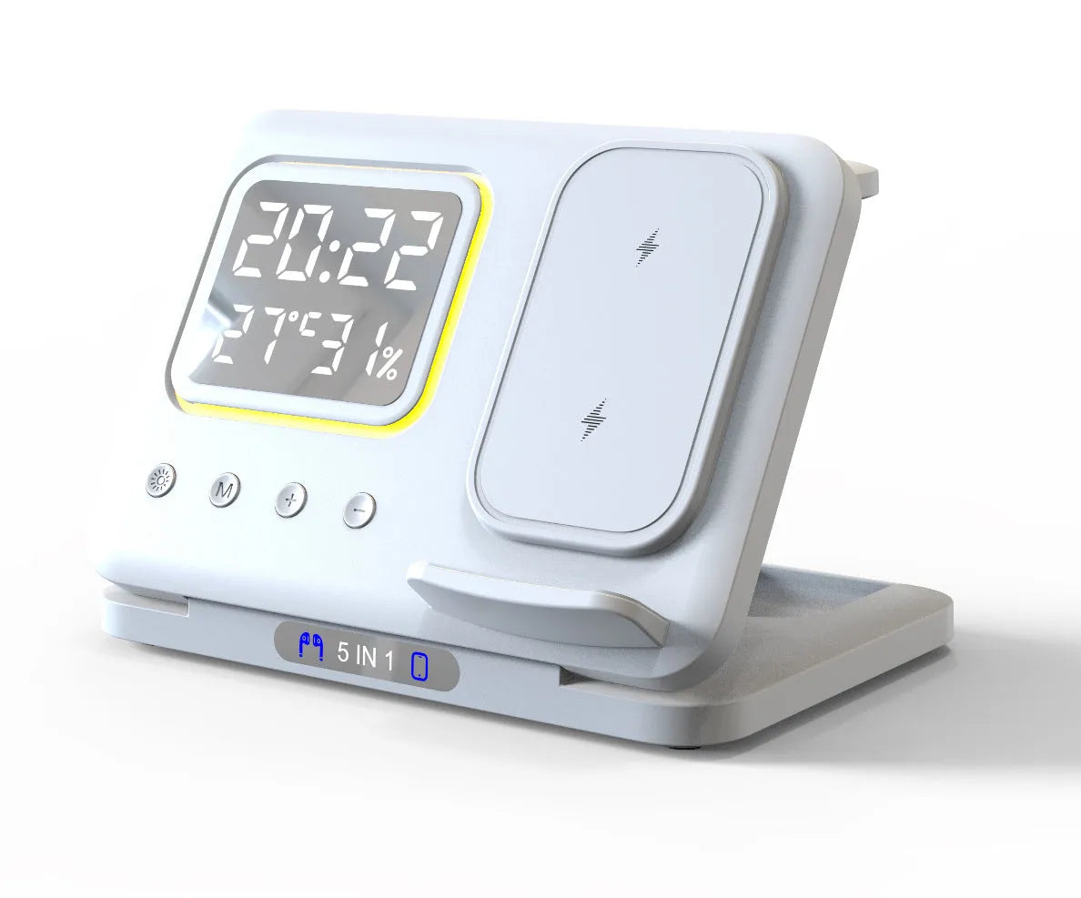 Black 5-in-1 wireless charging station showing phone charging alongside digital clock with temperature display