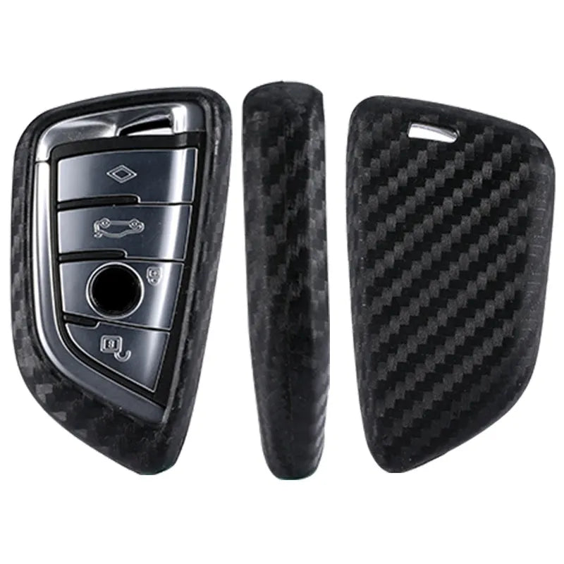 Carbon fibre silicone key case cover for blade-style car keys with impact cushioning and precise button cutouts