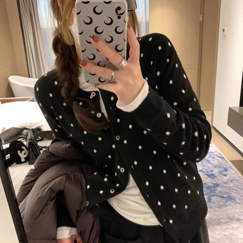Women's gray dot knitted cardigan with crocheted flowers in black or gray.
