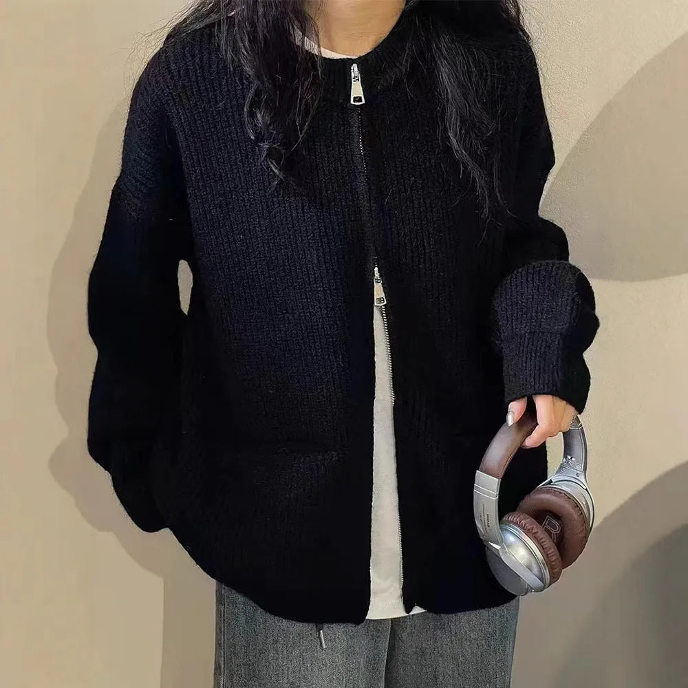 Beige women's soft viscose sweater coat cardigan with long sleeves on a hanger.