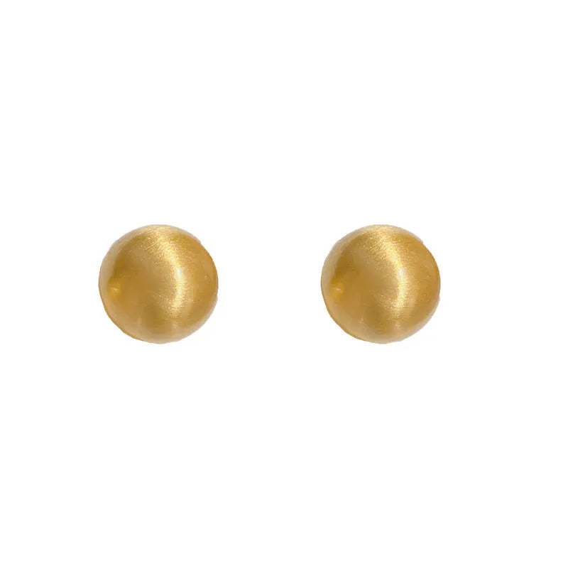 Simple round copper earrings in gold colour with electroplated finish
