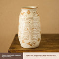 Chinese hand-painted ceramic joy vase with carved detail on desktop