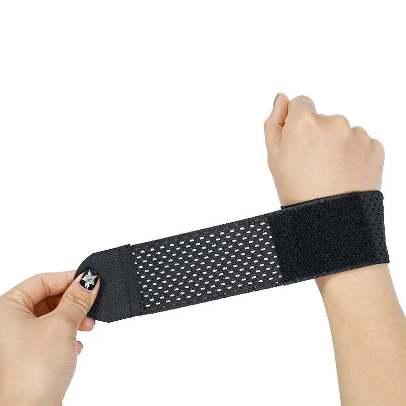 A black elastic breathable wristguard with an adjustable strap, designed for gym and weightlifting.