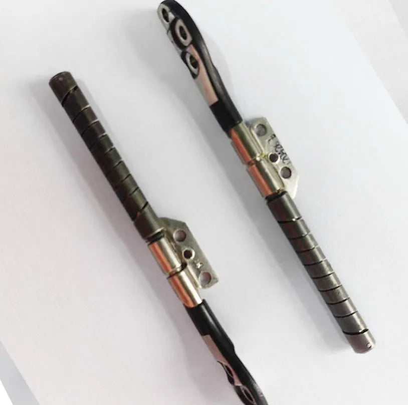 MacBook Pro 15-inch A1286 laptop screen replacement hinge shaft pair on foam packaging.