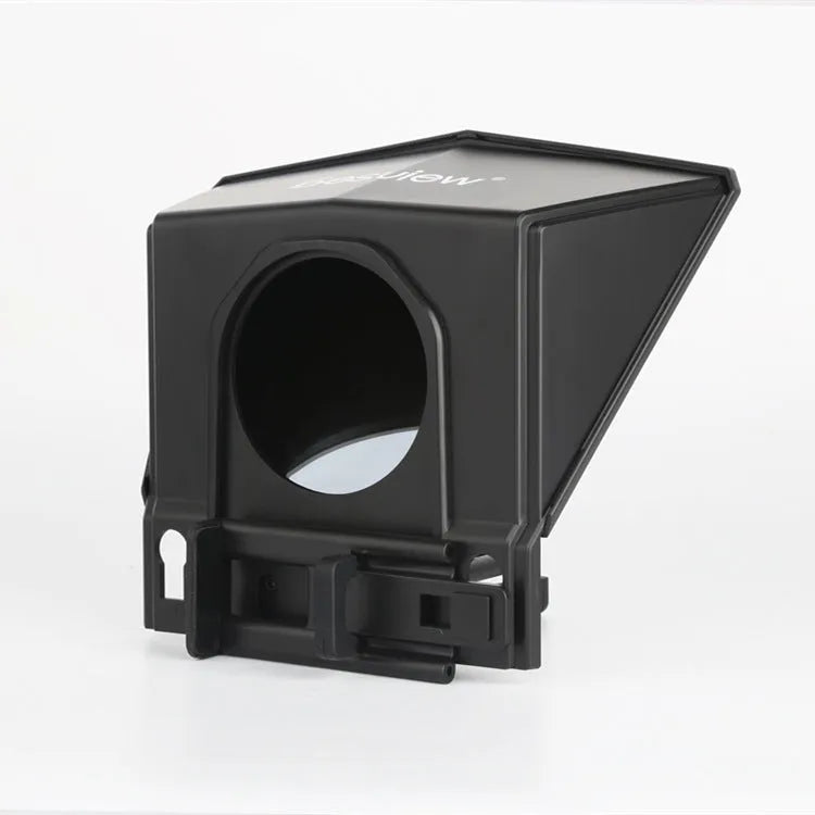 Portable small black cell phone teleprompter with adapter rings and remote control on a table