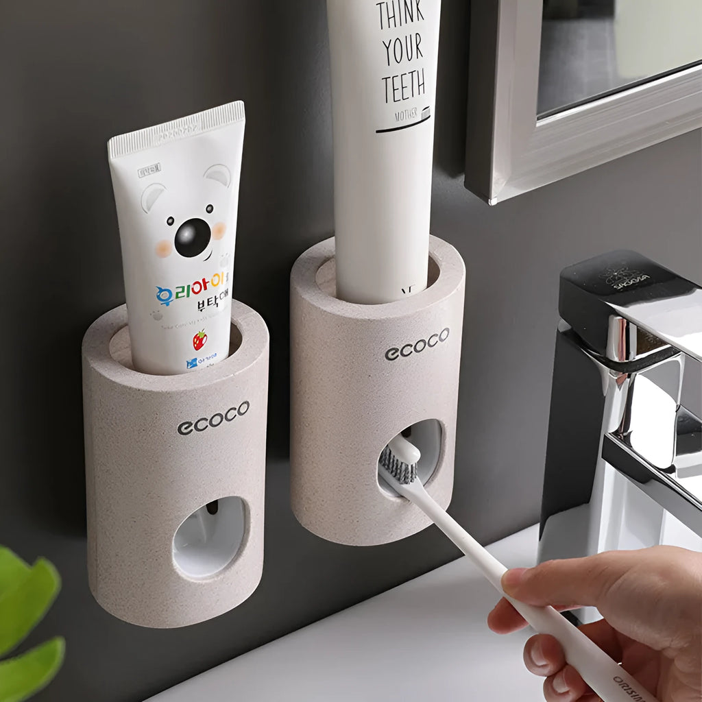 Two Ecoco single toothpaste dispensers in simple modern style, 15-18cm, on a bathroom countertop