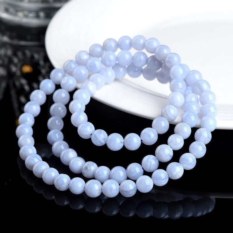 Blue agate bracelet with multi-circle stripe pattern and 6-6.8mm beads