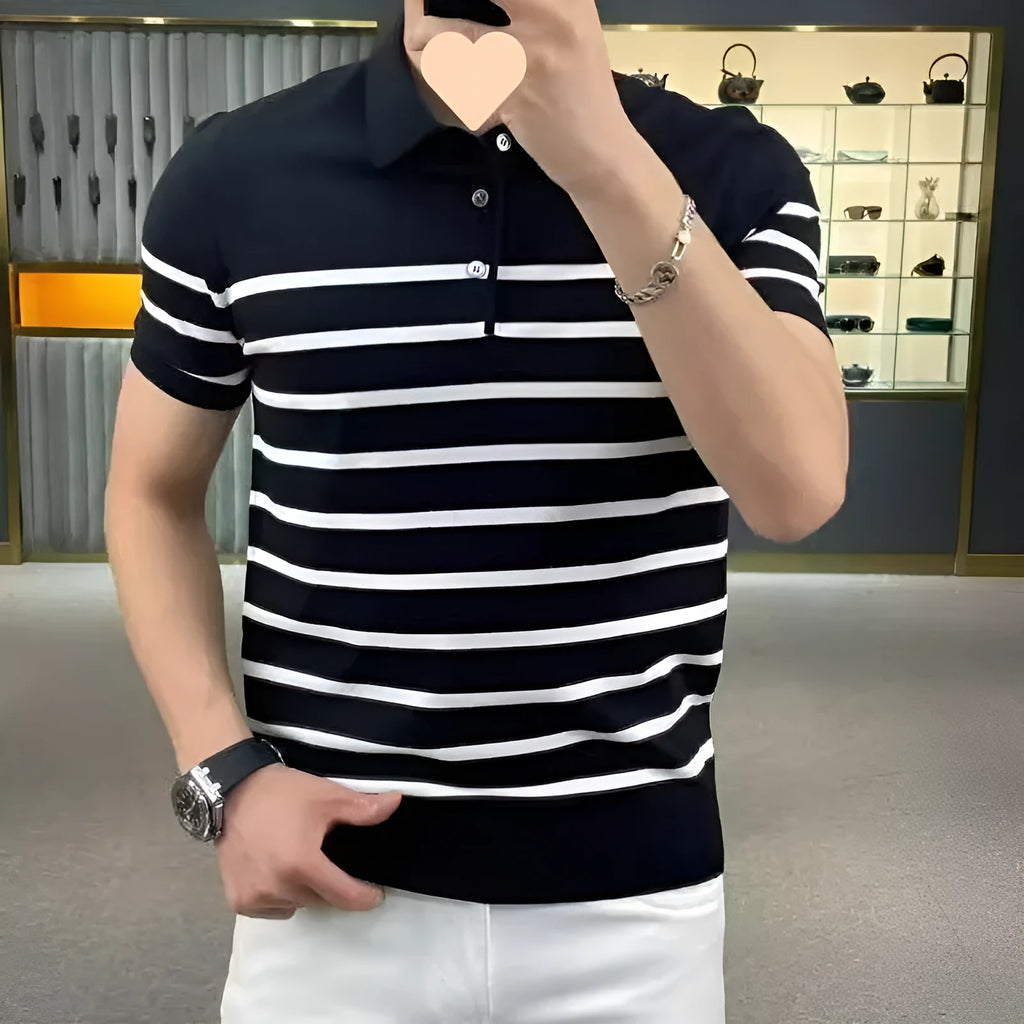 Black and white striped long-sleeve T-shirt with a lapel neckline on a hanger.