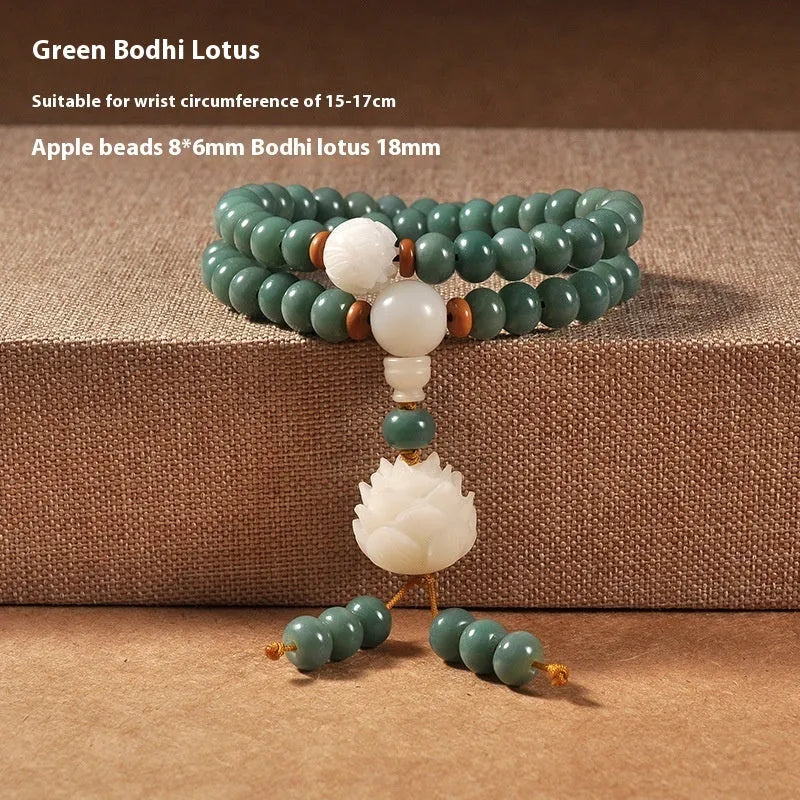 White jade and green sandalwood Bodhi seed bracelet with double ring safety buckle and lotus design.