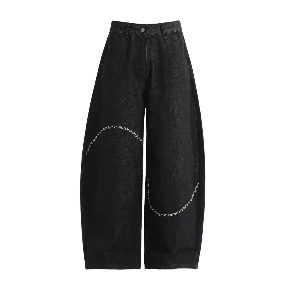 Black straight-leg denim trousers with mid-waist design and zip fly closure