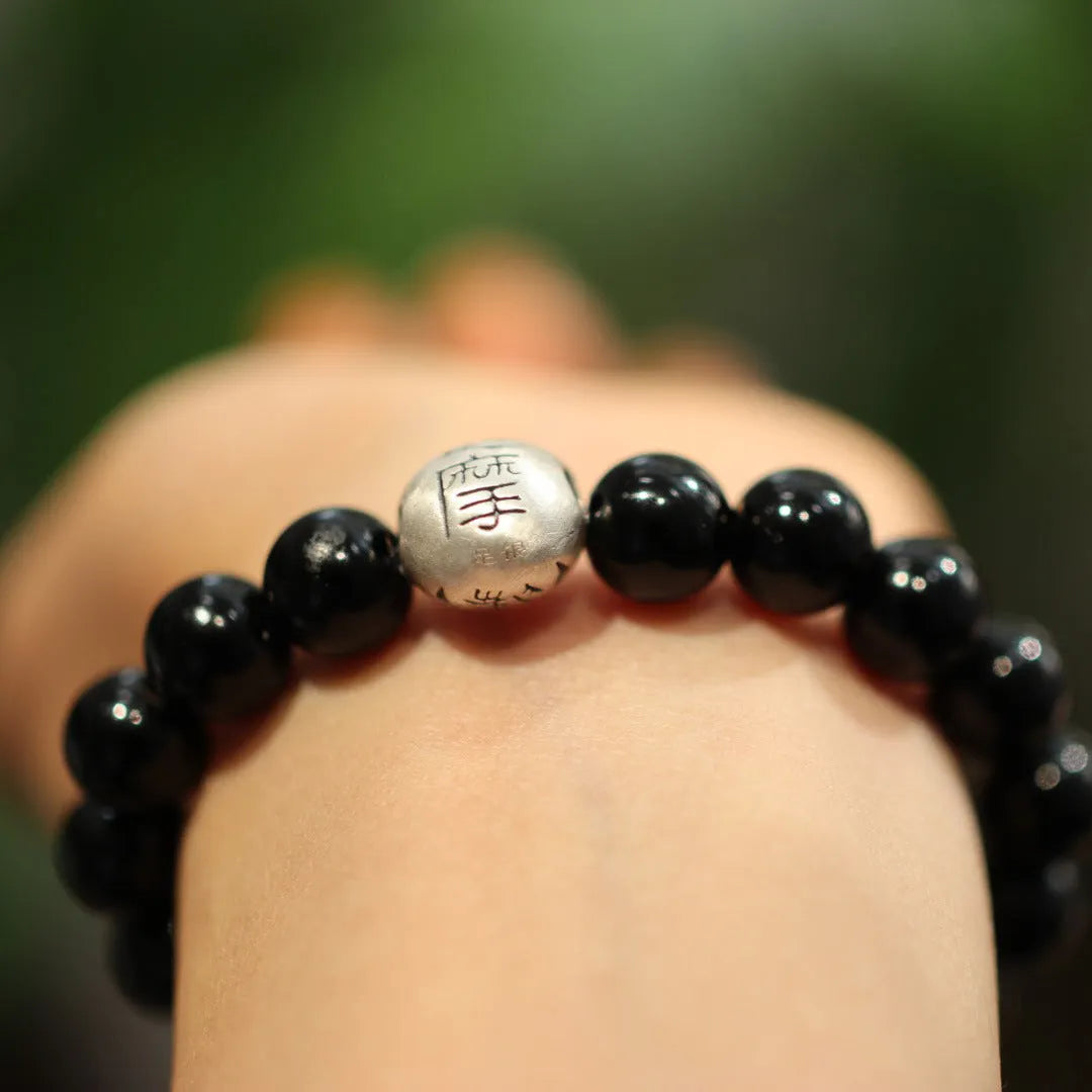 Women's black agate bracelet with 10mm beads and sterling silver clasp
