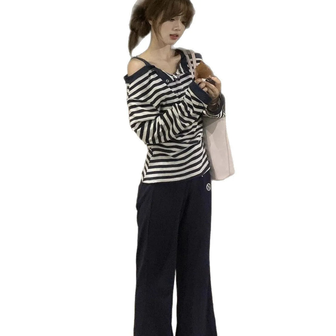 Dark blue oversized women's long-sleeved t-shirt with Korean-style embroidery and button details.