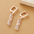 Rectangular two-tone hollow stud earrings with electroplated geometric design