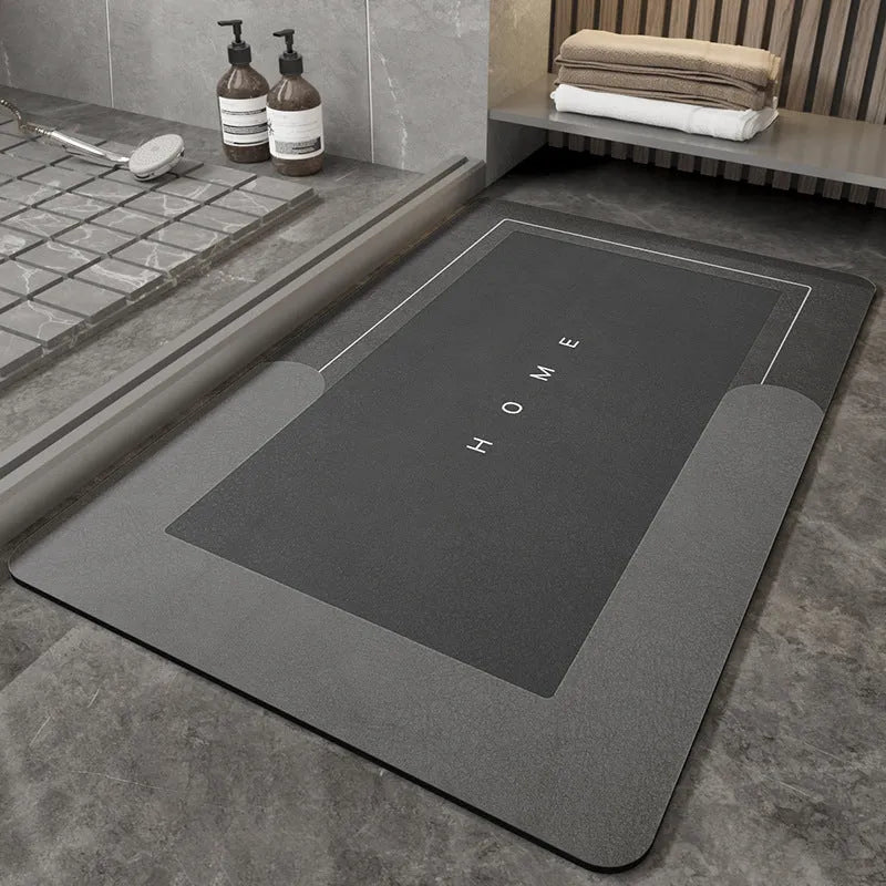 Blended material floor mat in blue colour with oval shape on bathroom floor