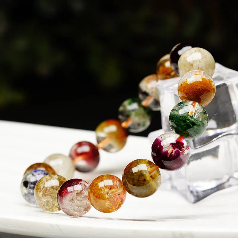 Ethnic style crystal bracelet with colourful ghost cornucopia beads, 10mm size, on an adjustable band.