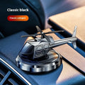 Silver metal solar helicopter car perfume ornament with rotating blades on car dashboard