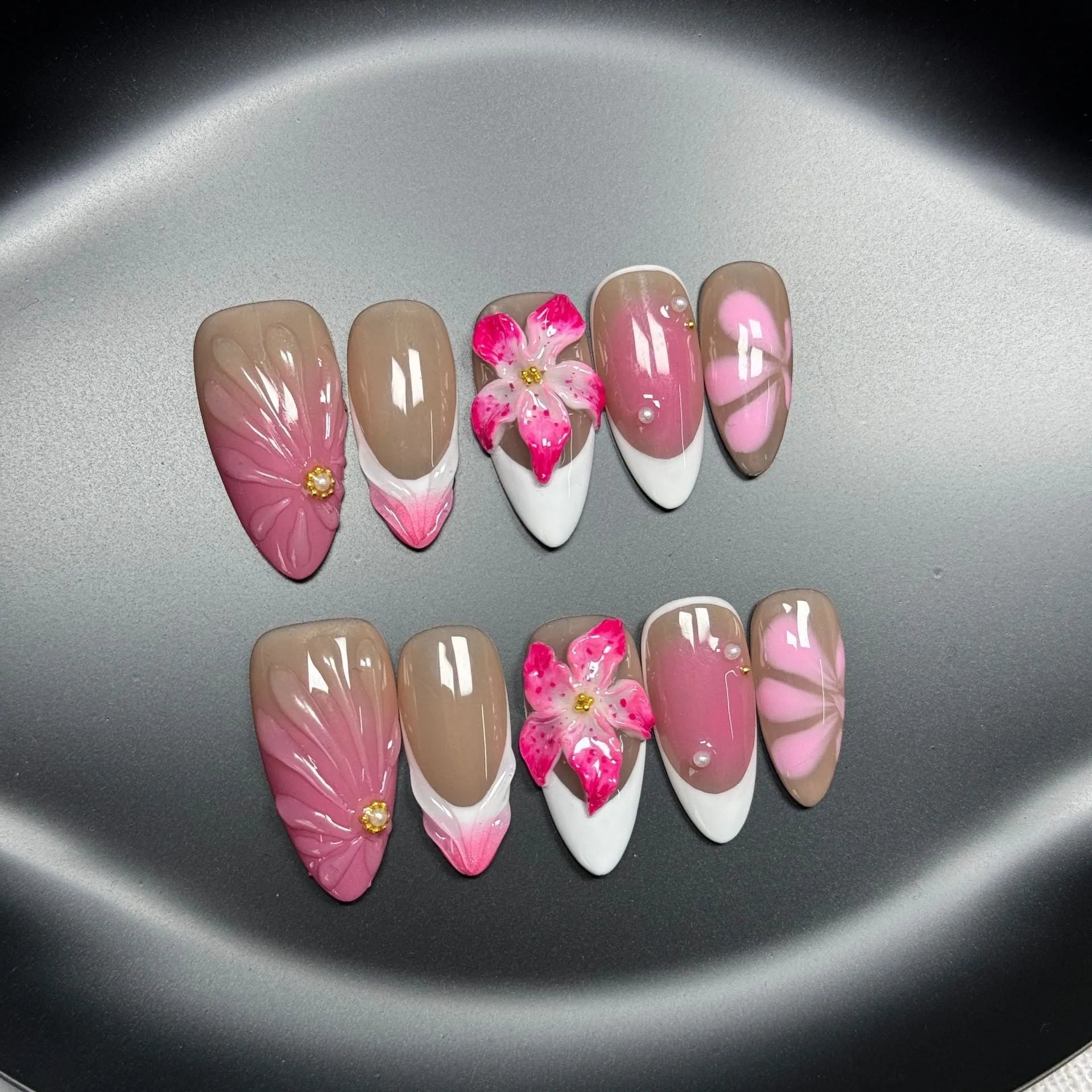 French style 3D lily ice flower design on almond-shaped plastic false nails.