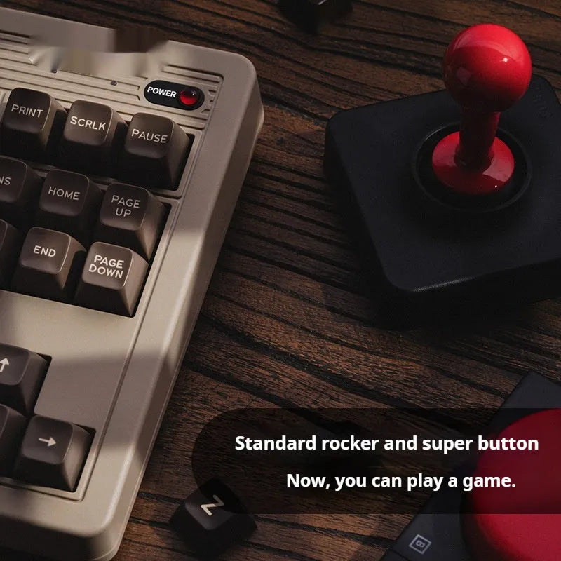 Retro C64-style wireless Bluetooth mechanical gaming keyboard with ABS construction on desk