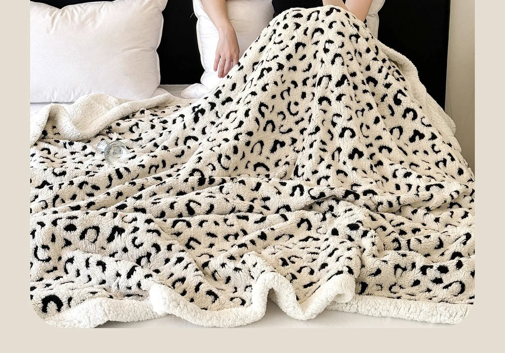 Double-layer cationic leopard jacquard taffeta cashmere lambswool blanket in a zebra print pattern