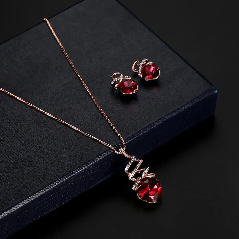 Alloy bridal jewellery set with water wave chain necklace and matching earrings on white background.