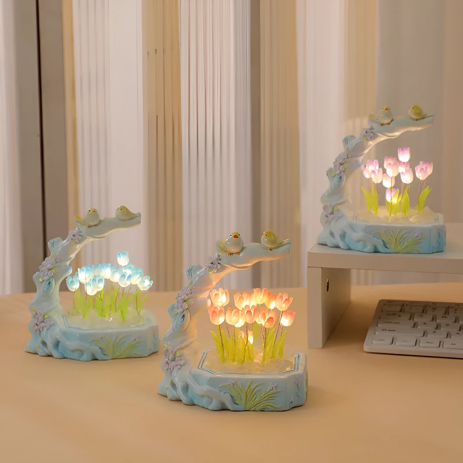 Resin tulip-shaped decorative night light assembled from DIY material package on a desk.