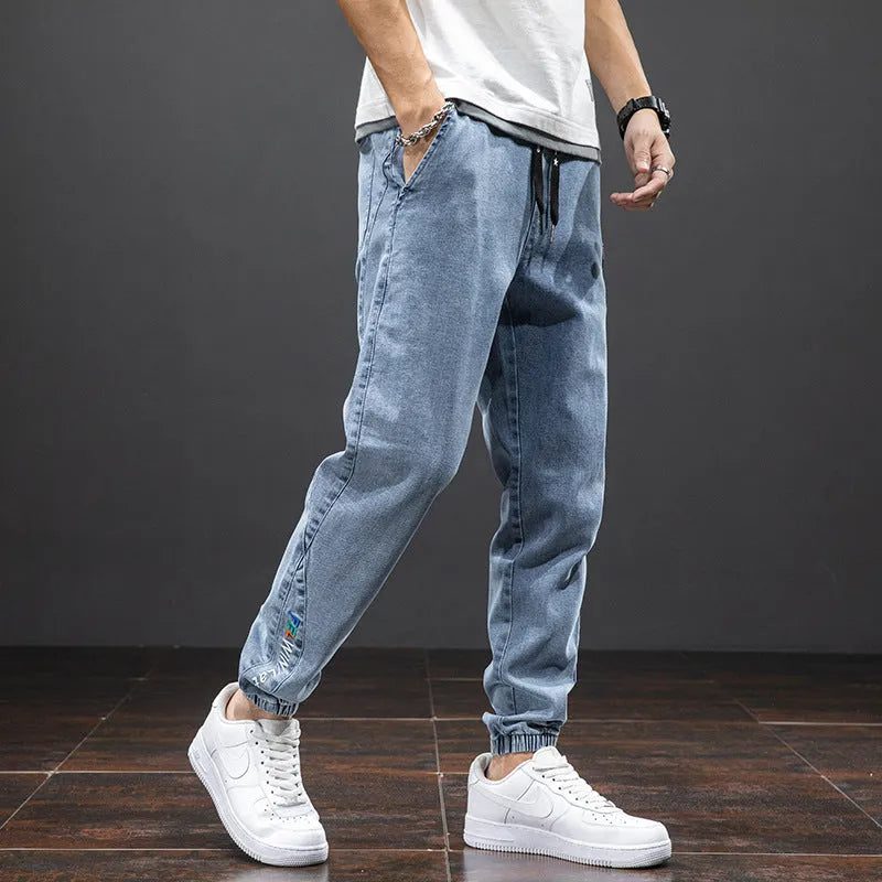 Men's cropped oversized straight leg jeans in blue made from high elastic cotton fabric with middle waist