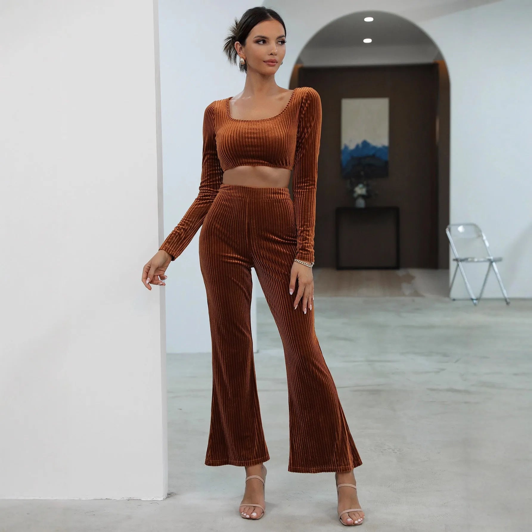 Caramel coloured long sleeve sweater and matching trousers casual set on hanger