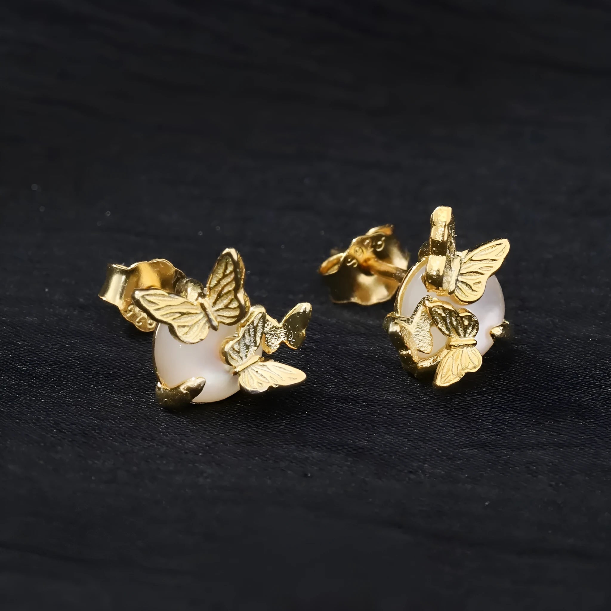 Butterfly ear studs in 925 silver with animal zodiac design and electroplated gold or white gold finish