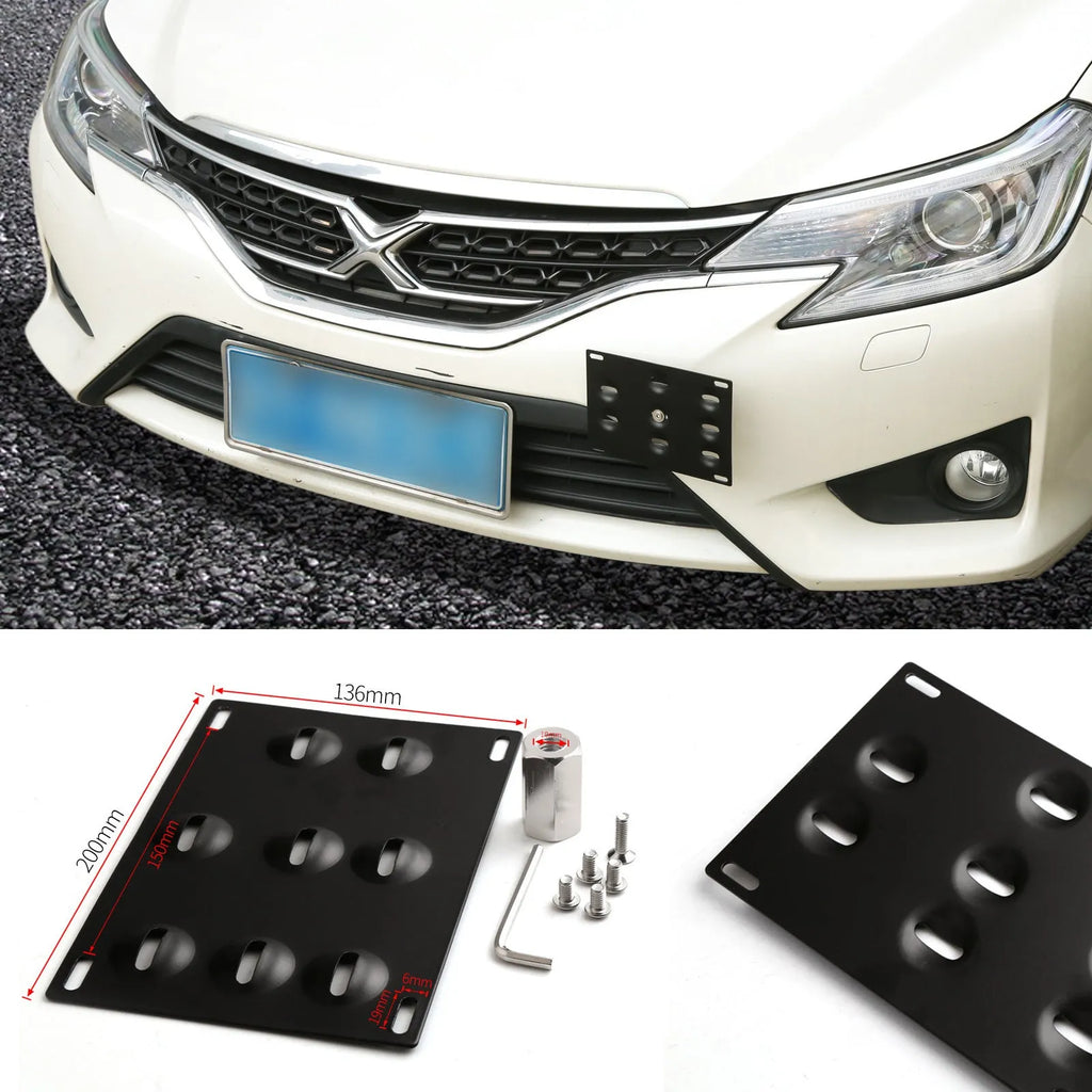 Silver metal car licence plate frame with a central towing hook, next to screws and a nut.