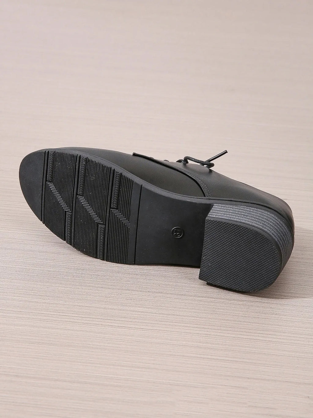 Black women's professional work shoes with thick chunky heel and low-top design