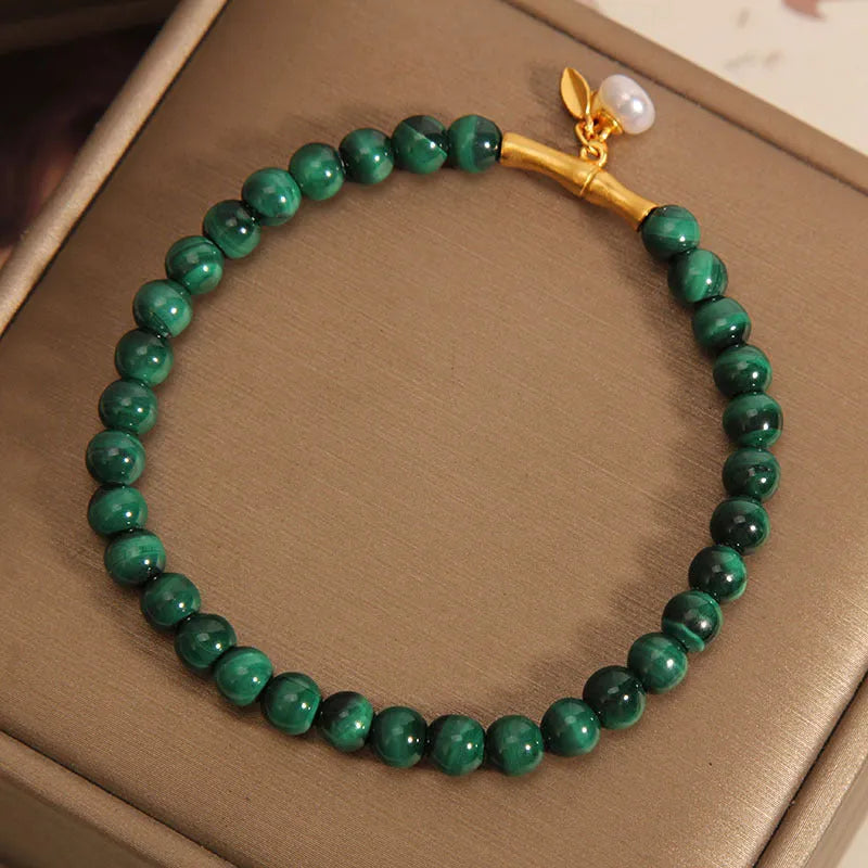 White crystal lucky bamboo bracelet for women, showing high-rise design on wrist.