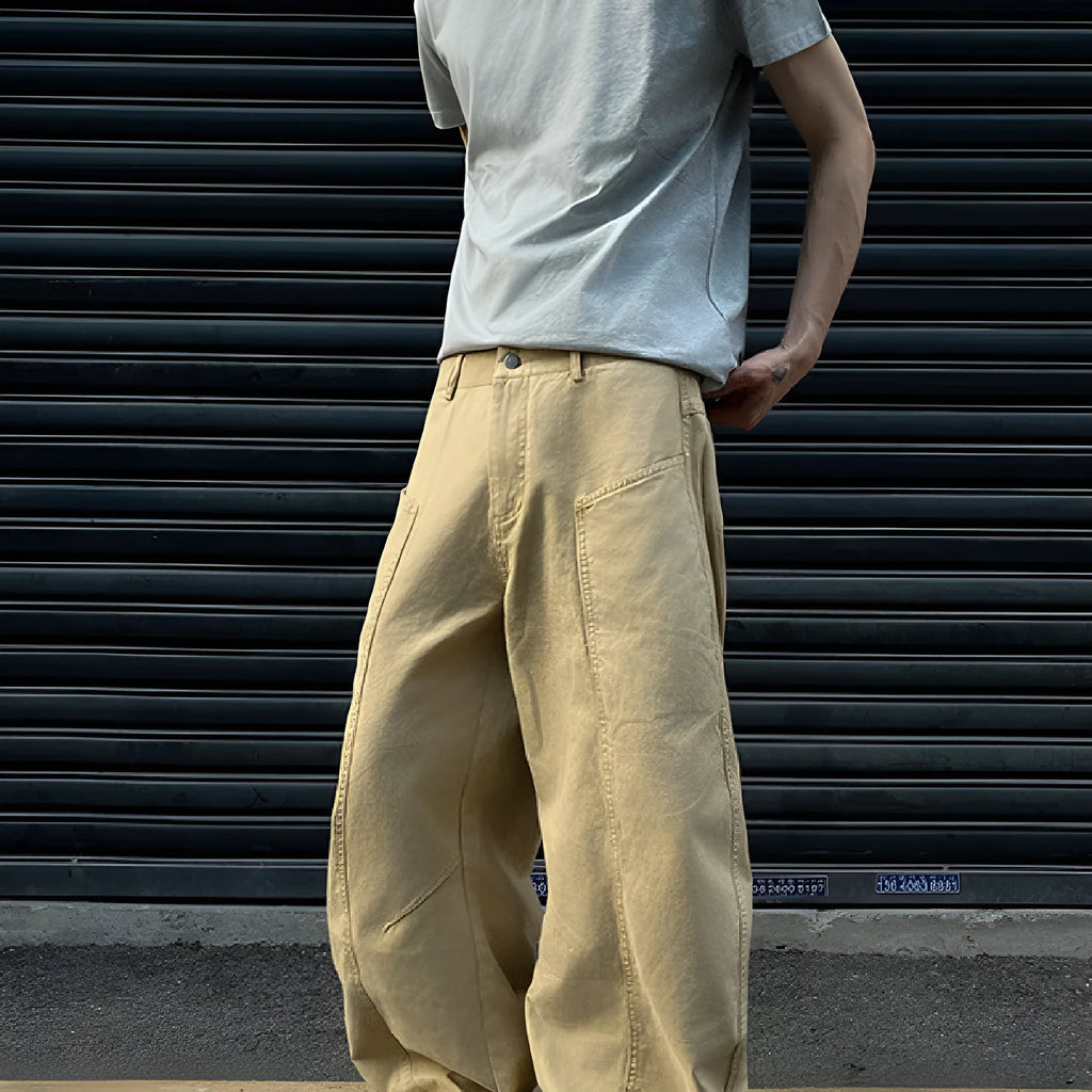 Men's khaki straight-leg cotton trousers laid flat, showing casual American retro style.
