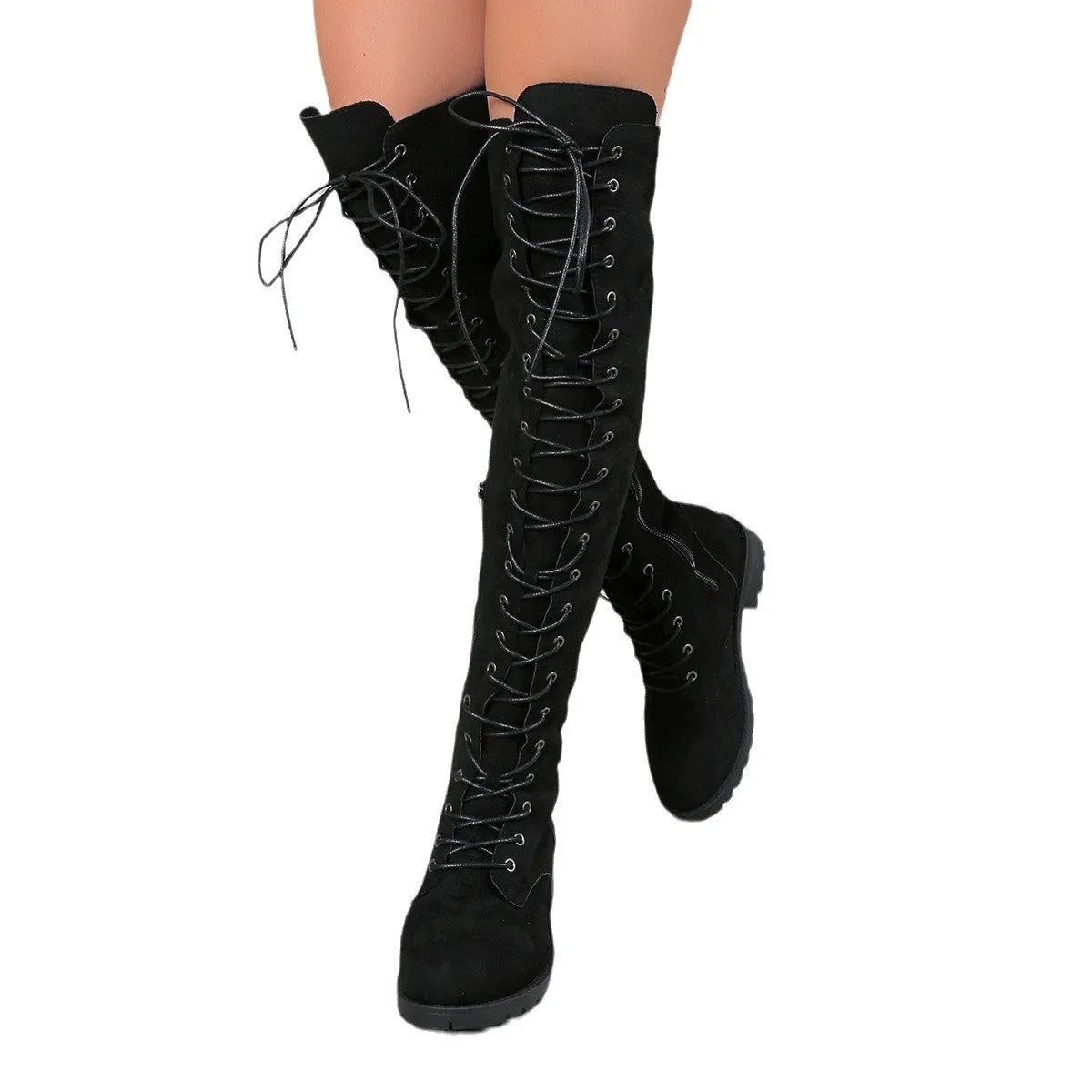 Black lace-up over-the-knee boots with round toe and flat rubber sole on a neutral background.