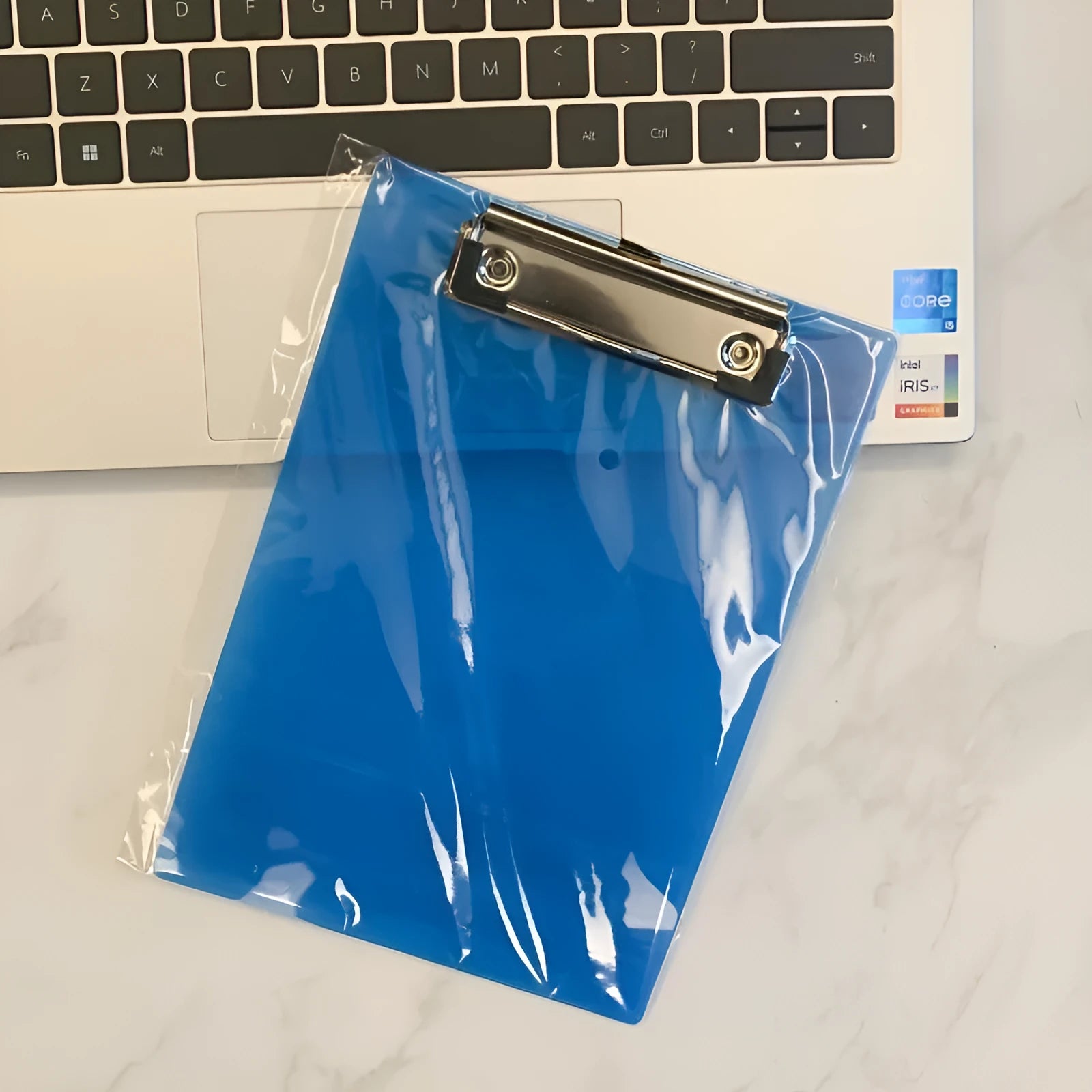 Transparent A4 plate holder with metal clip in blue, green, red, and white colour options