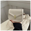 Soft PU leather messenger bag with clamshell opening in a horizontal square shape.