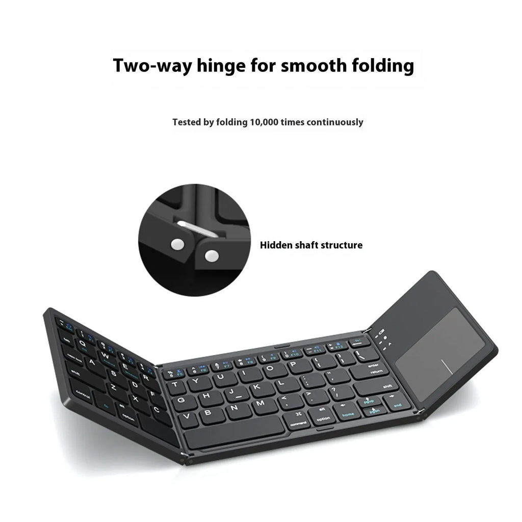 Black tri-fold Bluetooth keyboard unfolded, showing its thin profile and compact size next to a smartphone.
