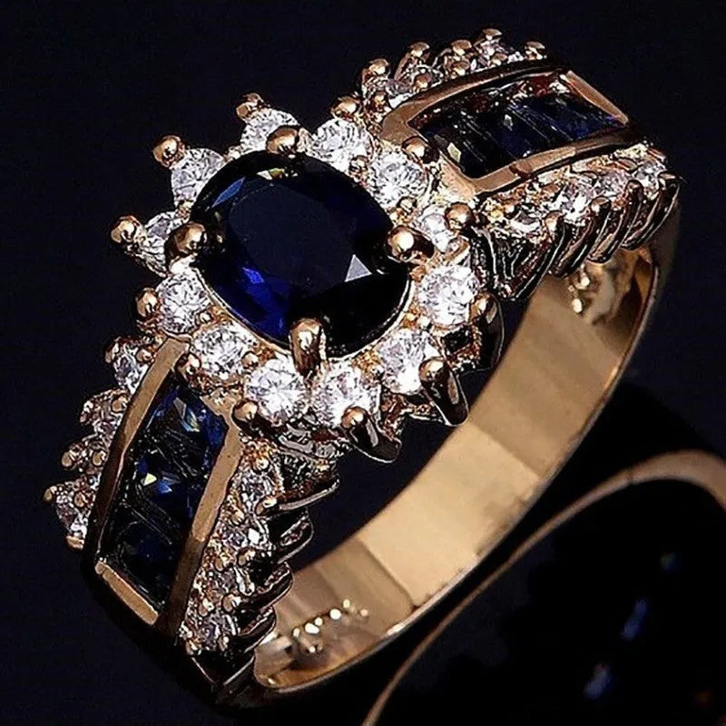 Personalised zinc alloy fashion ring with diamond and zircon details in blue and purple.