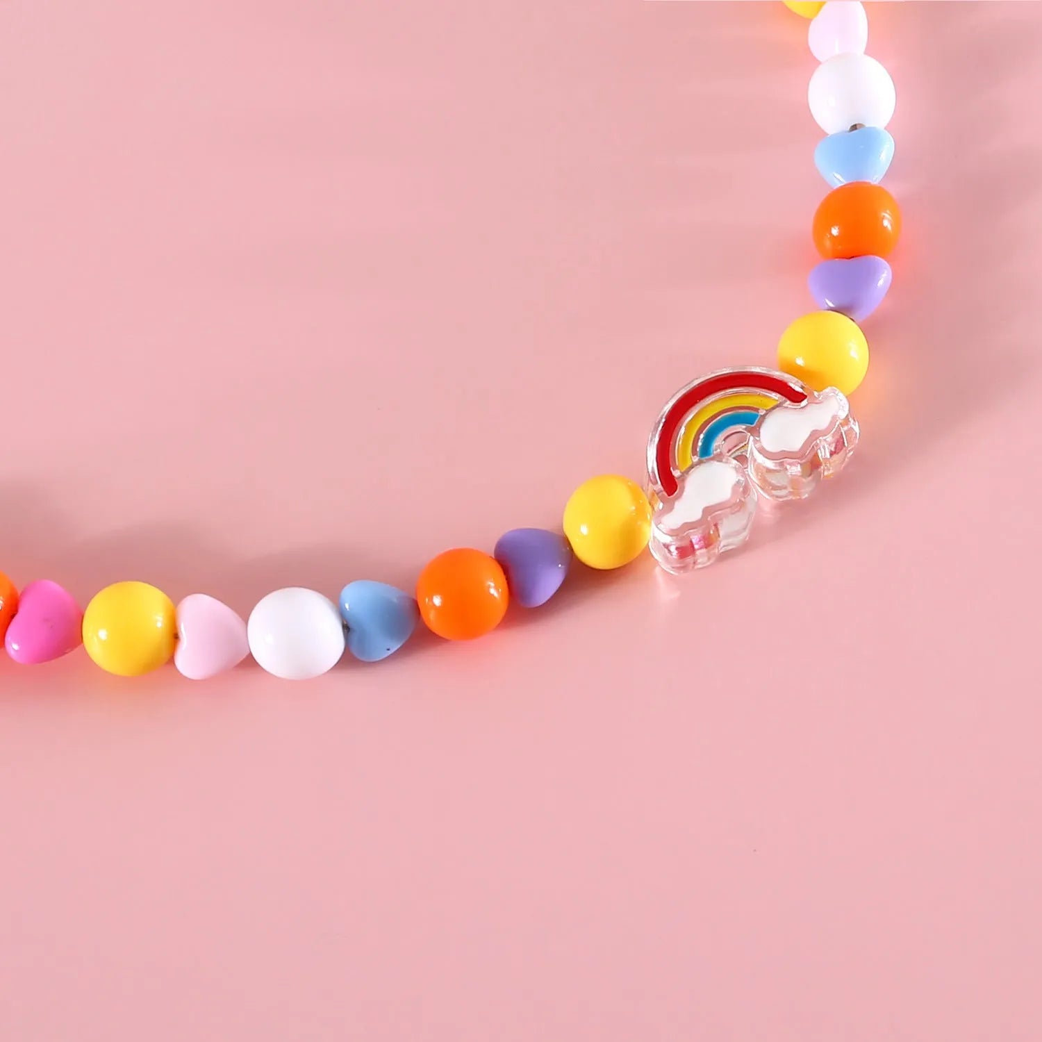 Colourful plastic bead pet necklace for cats with floral and rainbow designs in adjustable XS and S sizing