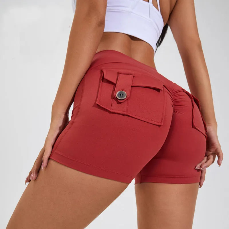 Women's high-waist fitness shorts with side pockets in quick-dry nylon fabric