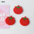 Set of medium-sized plastic or resin round tomato buttons with printed patterns in mixed or solid colours