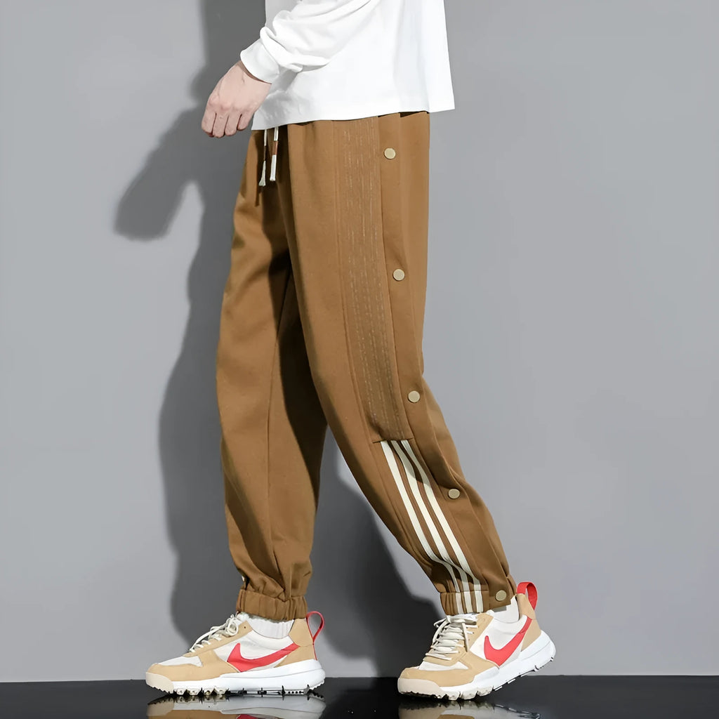 Men's black cotton blend sweatpants with high waist, belt, and adjustable ankle ties