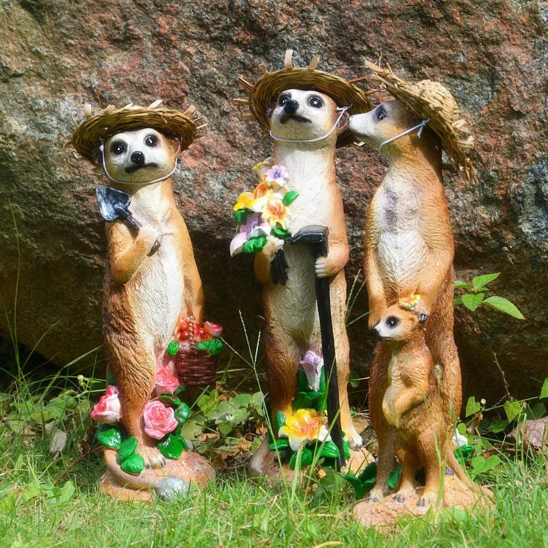 Straw hat wearing mongoose garden ornament in synthetic resin