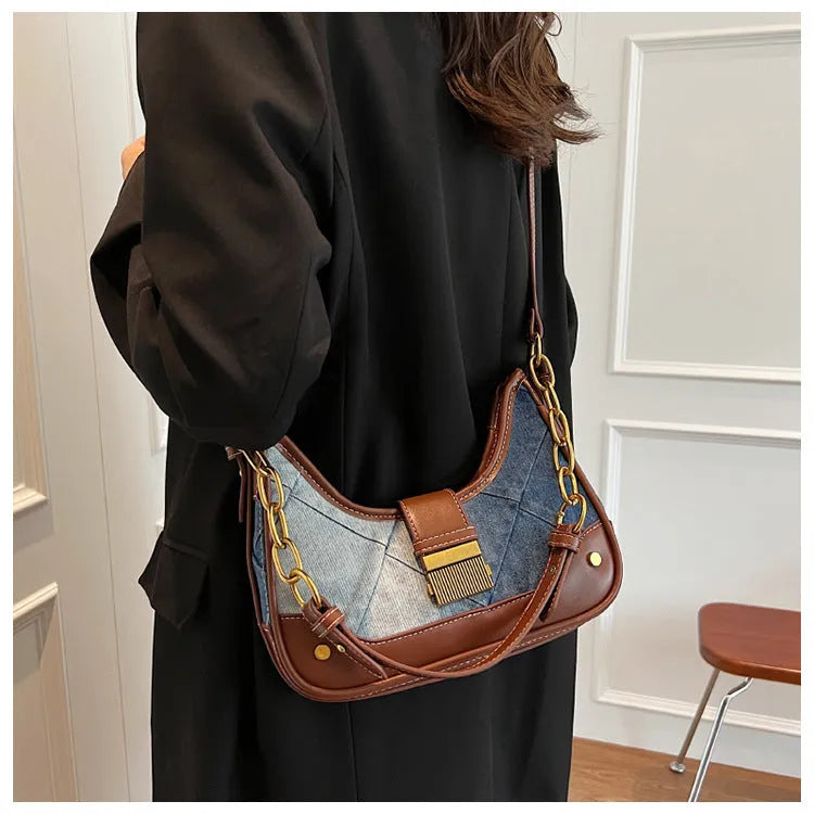 Brown denim women's bucket shoulder bag with diamond chain detailing and double straps