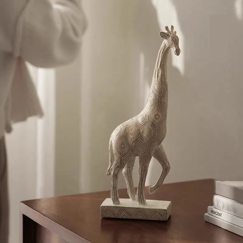 Wood colour giraffe-shaped resin ornament on a shelf, showing European style design.